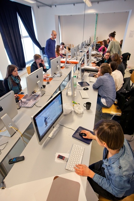 Students at workstations in a modern school computer laboratory
